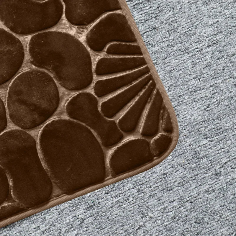 Detalhes do tapete Conchas marrom com textura macia,  moderna e confortável.